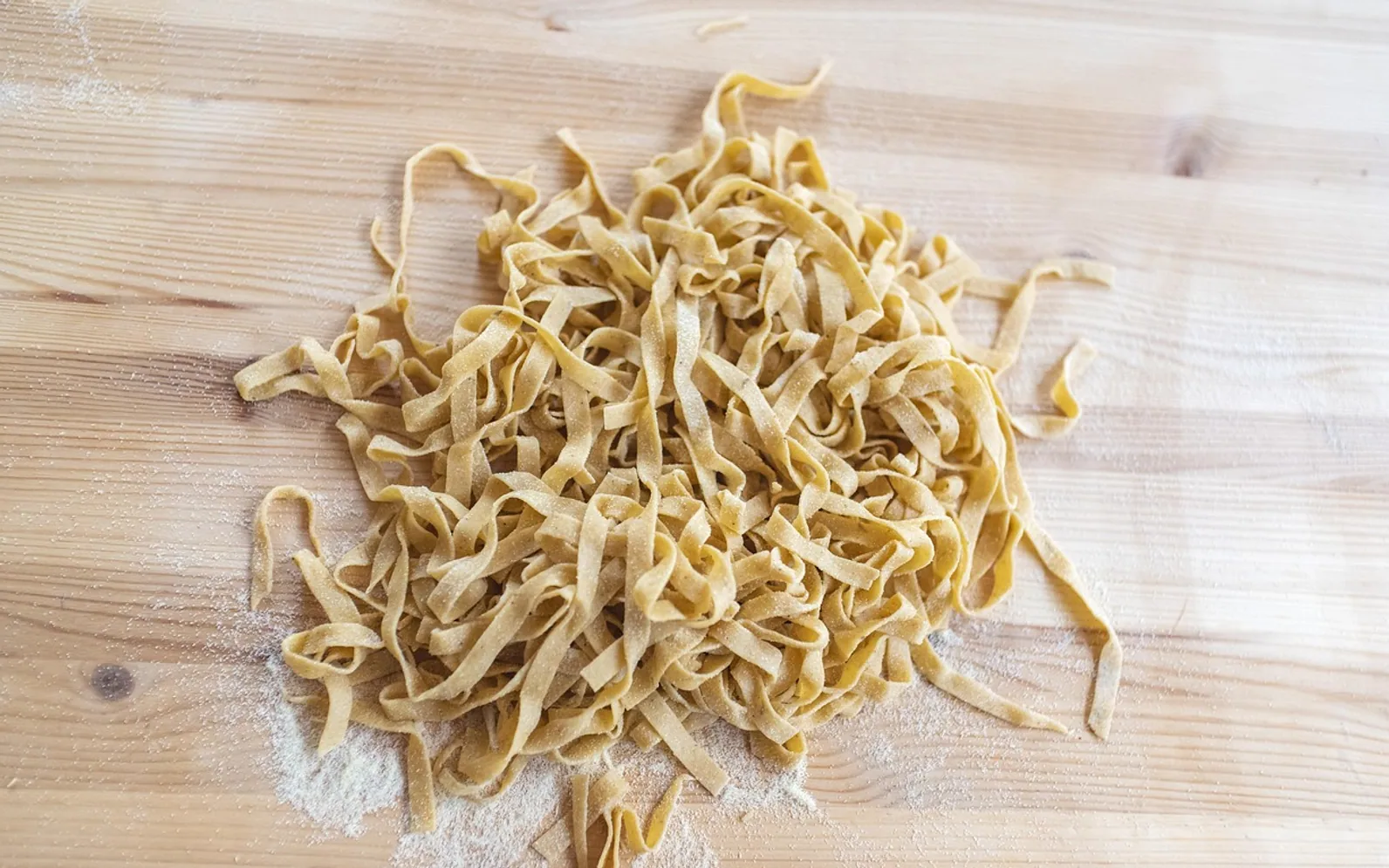 Pasta machine, spaghetti and chef