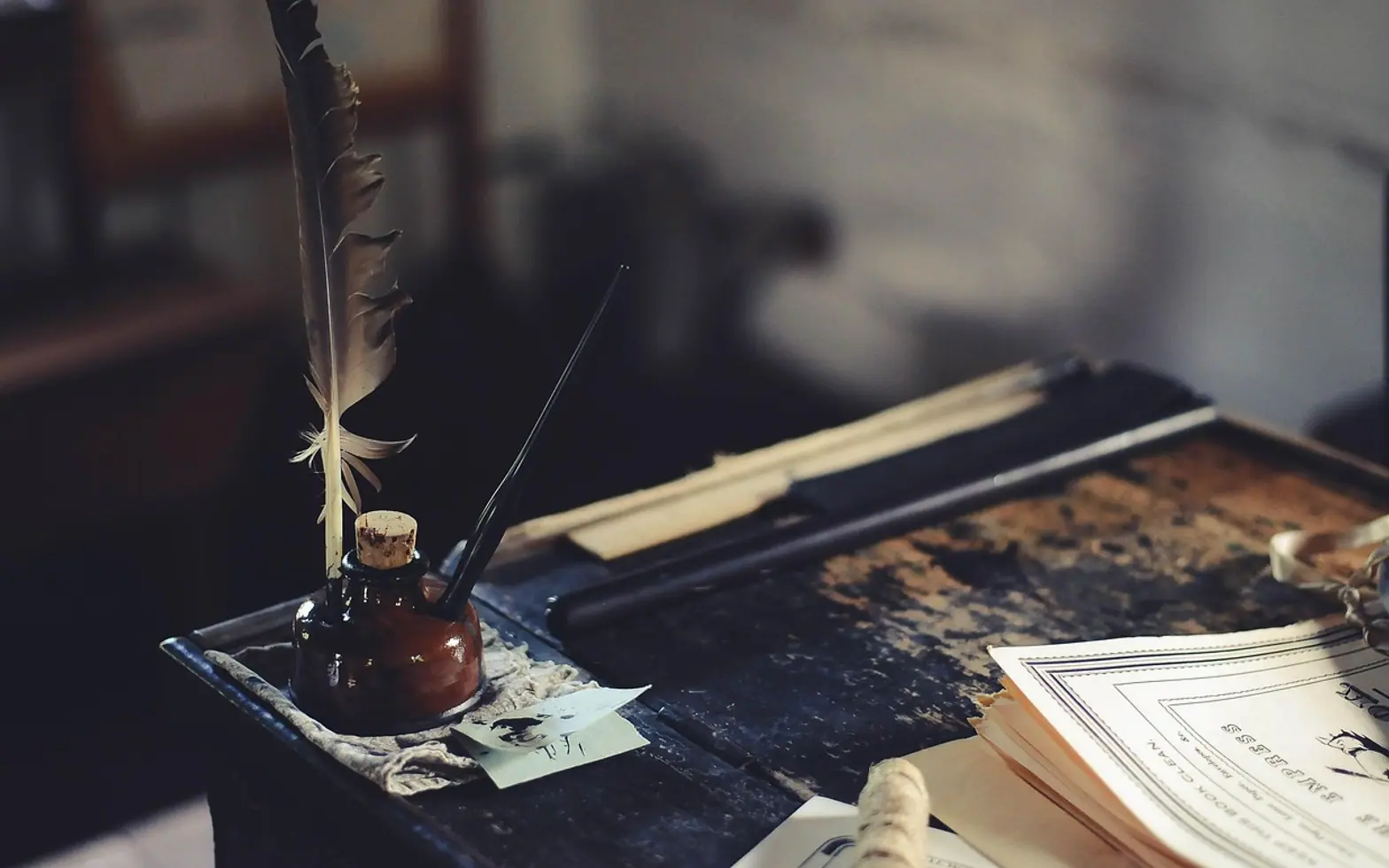 Desk, ink and feather