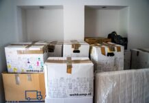 A Practical Timeline for Moving Home in Augsburg Cardboard boxes packed for a home move